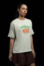 Outlaws Women Creative Hustle Oversized T-Shirt | Cream Graphic Printed Casual Loose Fit Tee for Women
