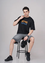 Men's Outlaws Graphic T-Shirt from Outlaws Fashion featuring bold black and white outlaw-themed print on soft cotton fabric.