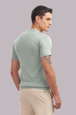 Mint green men's textured cotton polo shirt by Outlaws Fashion, showcasing a casual yet stylish smart casual wear look.