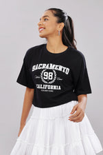 Black cotton boxy top for women with extended sleeves, stylish and comfortable, by Outlaws Fashion.