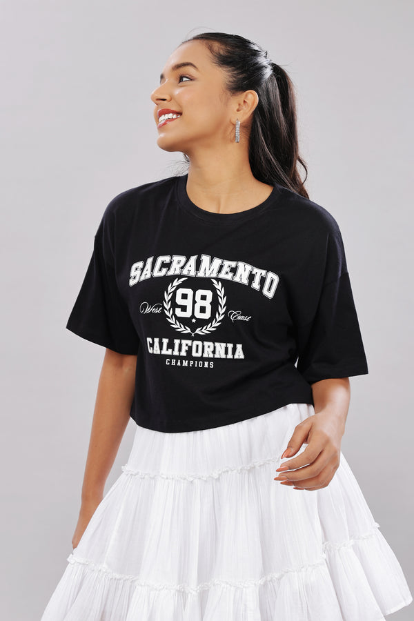 Black cotton boxy top for women with extended sleeves, stylish and comfortable, by Outlaws Fashion.