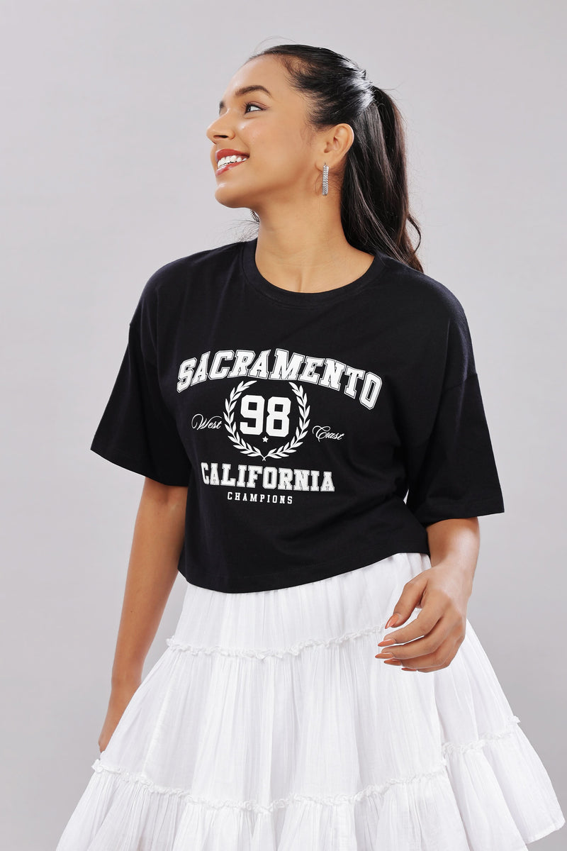 Black cotton boxy top for women with extended sleeves, stylish and comfortable, by Outlaws Fashion.