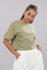 Printed olive cotton boxy top for women with extended sleeves by Outlaws Fashion, shown on a model with a relaxed fit.
