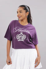 Printed purple cotton boxy top for women with extended sleeves, featuring a relaxed fit and vibrant floral design.
