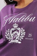 Printed purple cotton boxy top for women with extended sleeves, featuring a relaxed fit and stylish design.